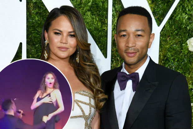 Chrissy Teigen bares a boob onstage at husband's NY gig